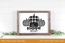 Load image into Gallery viewer, Have A Grateful Heart SVG with buffalo plaid and leopard print pumpkins framed over mantle
